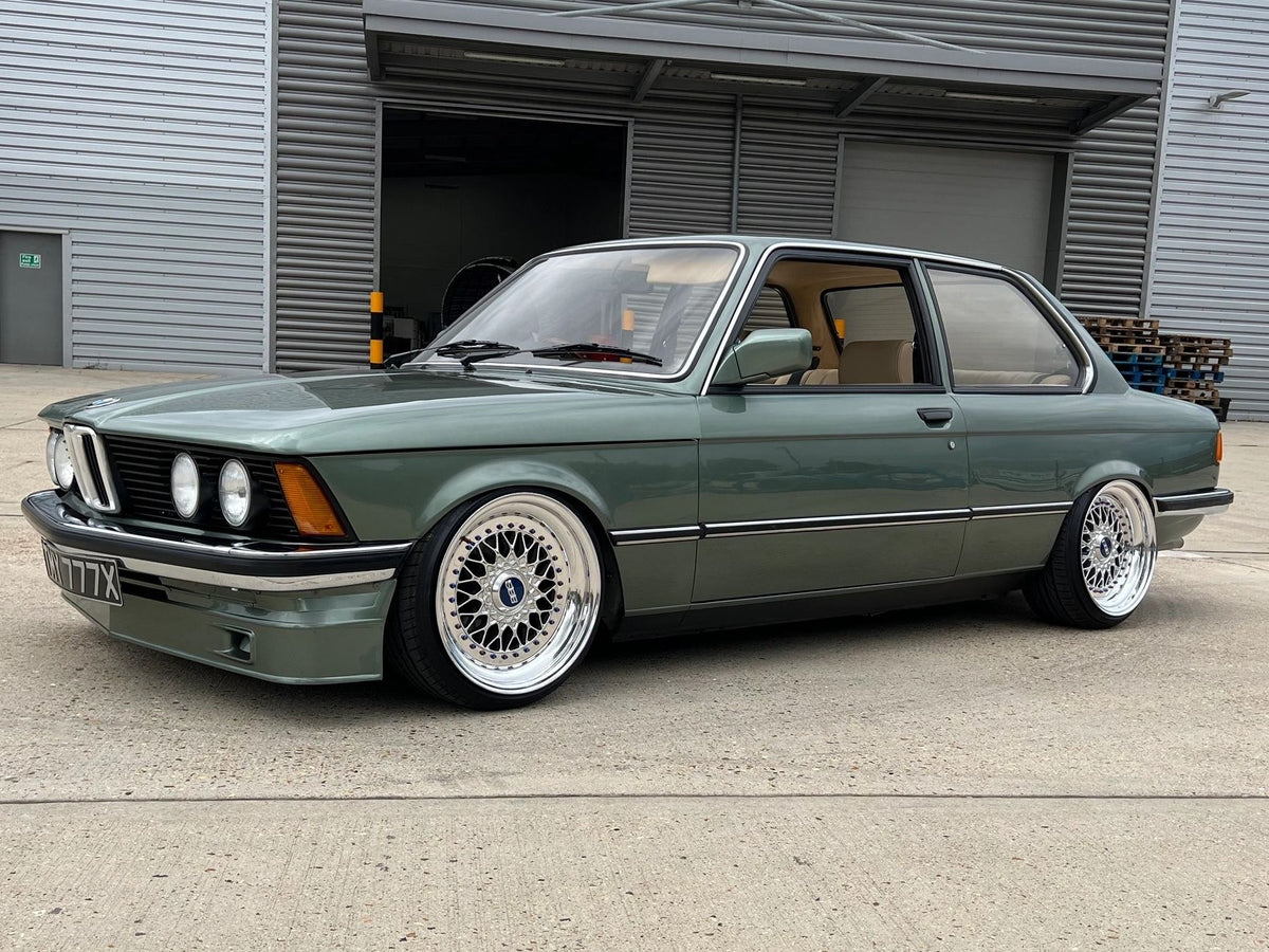 Green BMW E21 on custom wheels