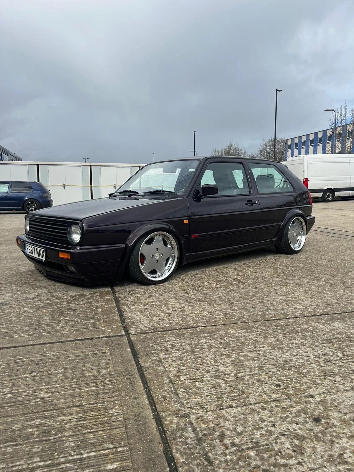 Black Volkswagen Golf Mk2 on custom wheels
