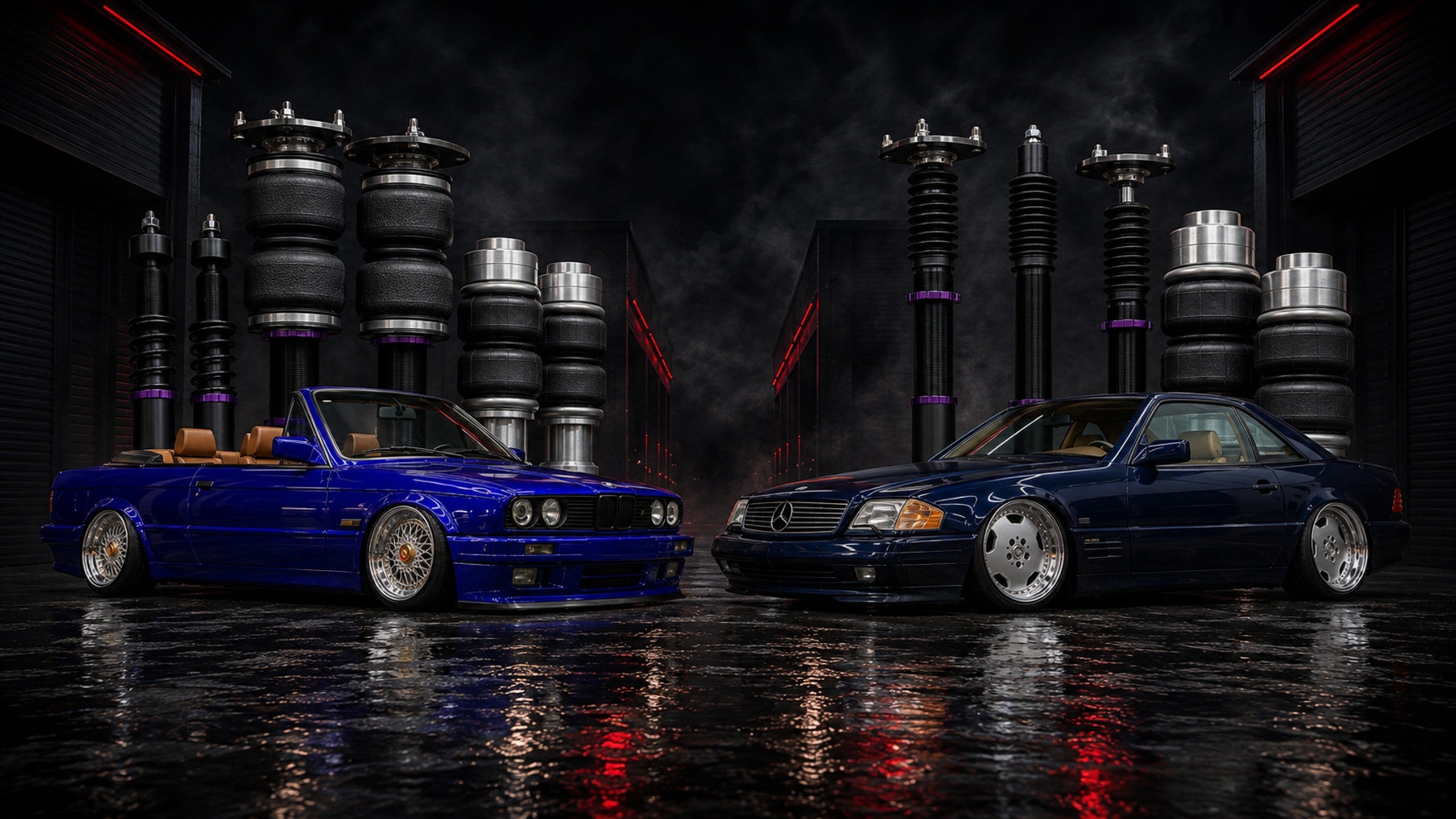 Lowered blue BMW E30 convertible and navy Mercedes SL R129 facing each other with their air ride suspension kits behind them