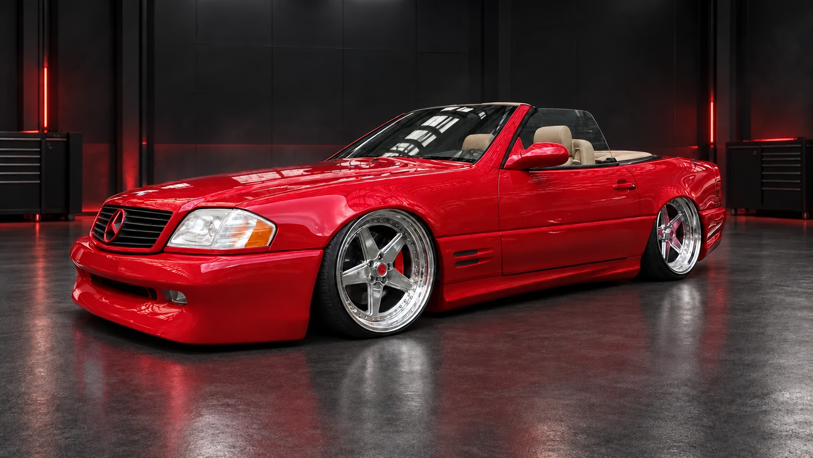Left side studio view of red Mercedes-Benz SL R129